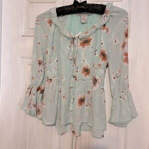 NWT mint green floral and Uber feminine top! Frills bows and more!